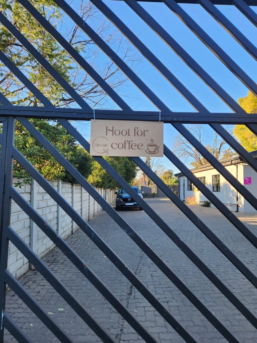 Lila Cafe interior showing comfortable seating area with natural lighting