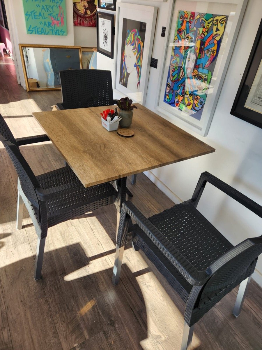 Lila Cafe interior displaying the counter area and coffee preparation space