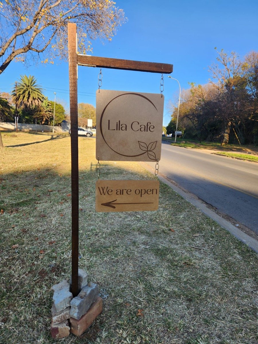 Lila Cafe interior showcasing the dining area with tables and chairs